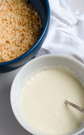 Bowl of Krispie Cereal and Bowls of melted butter/marshmallow mixture