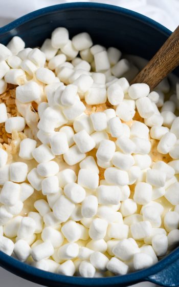 Adding marshmallows to Krispie Mixture