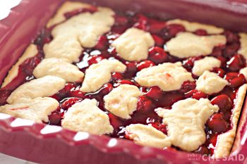 Close up of baked cherry bars in baking dish