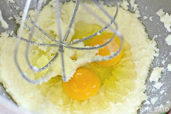 Adding egg to dough mixture