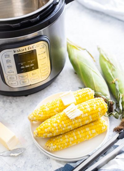 IP Corn on the Cob - Cobs on a plate with butter pats