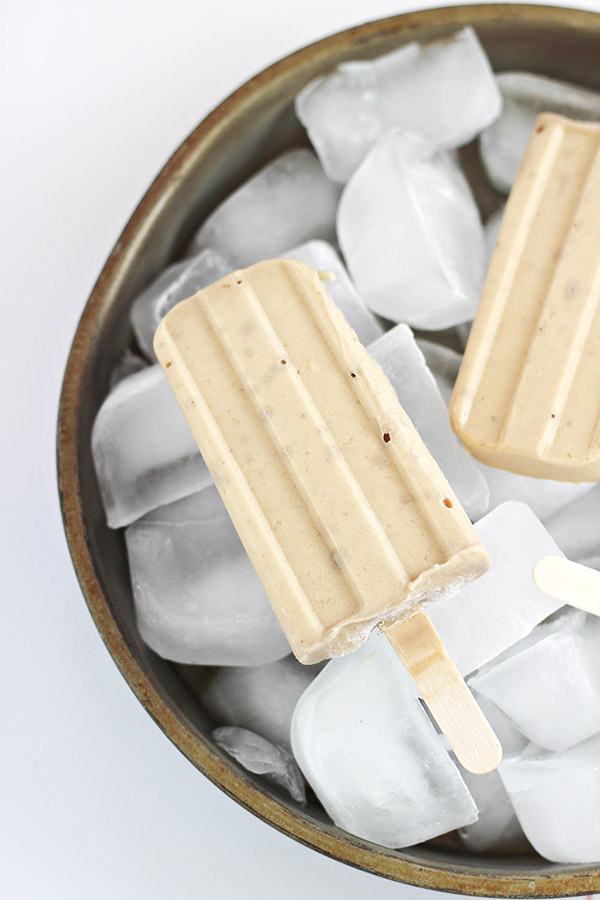 Peanut butter and Banana pops on a bowl of ice