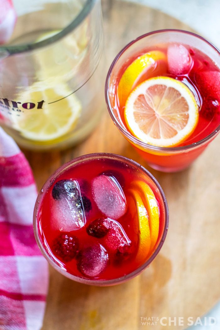 Overhead view of garnished berry lemonade.