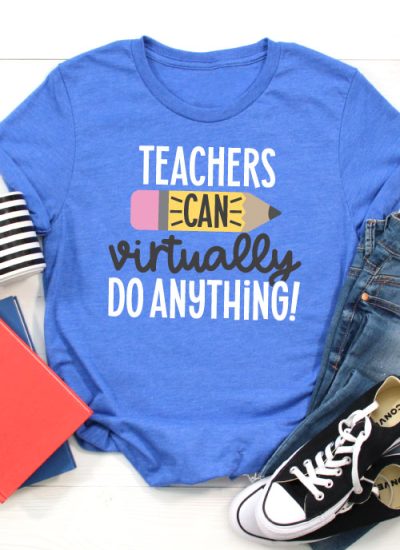 Blue T-shirt with jeans, converse, a coffee mug and folders that has the SVG File "Teachers Can Virtually Do Anything" in iron on in vertical orientation