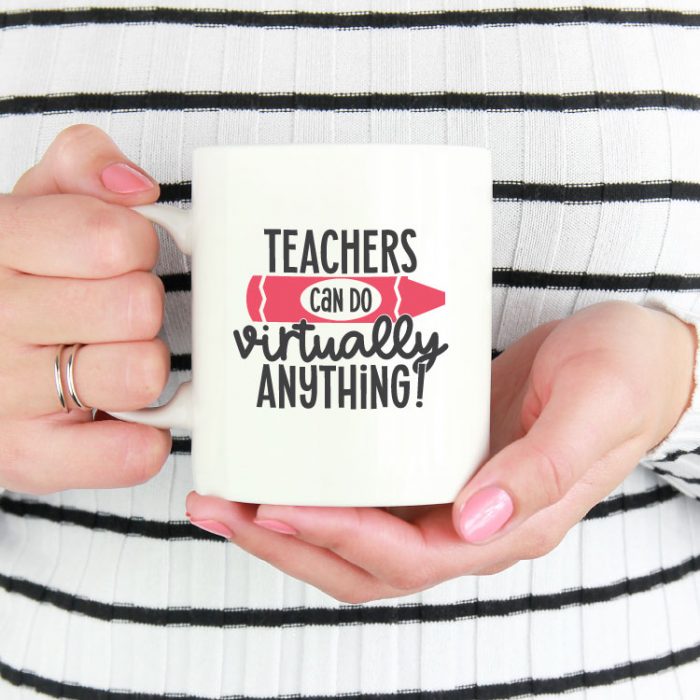 Woman holding white coffee mug with "Teacher Can Virtually Do Anything" in adhesive vinyl - square format