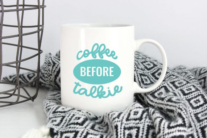 Black and White Blanket with White Mug and Coffee Before Talkie applied in aqua adhesive vinyl - Horizontal Orientation