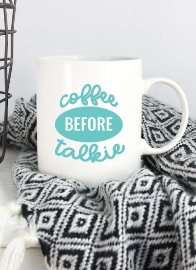 Black and White Blanket with White Mug and Coffee Before Talkie applied in aqua adhesive vinyl - Vertical Orientation