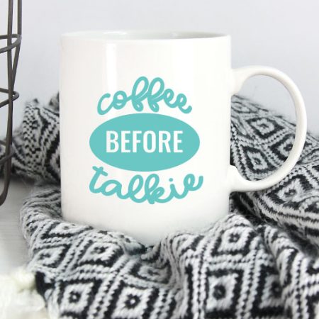 Black and White Blanket with White Mug and Coffee Before Talkie applied in aqua adhesive vinyl - Vertical Orientation