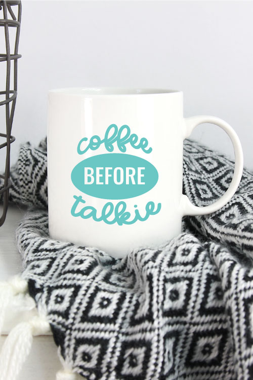 Black and White Blanket with White Mug and Coffee Before Talkie applied in aqua adhesive vinyl - Vertical Orientation