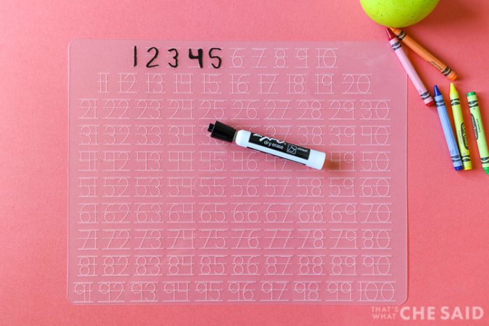 Numbers tracing mat with numbers 1-5 traced in dry erase marker