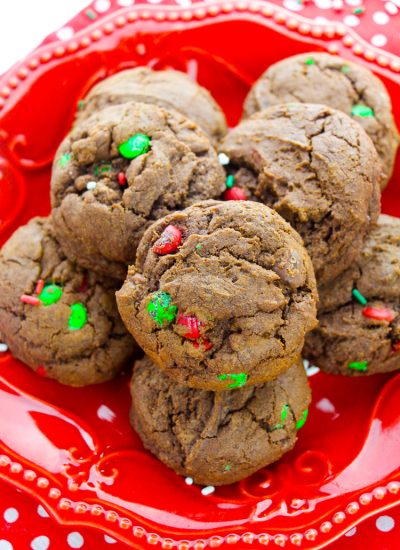 Red holiday plate with chocoalte cookies with red and green m&ms