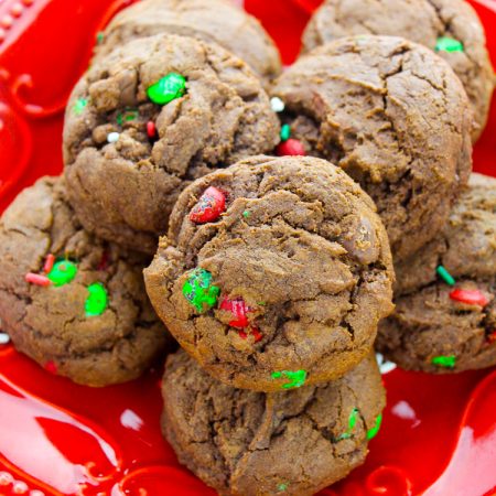 Red holiday plate with chocoalte cookies with red and green m&ms