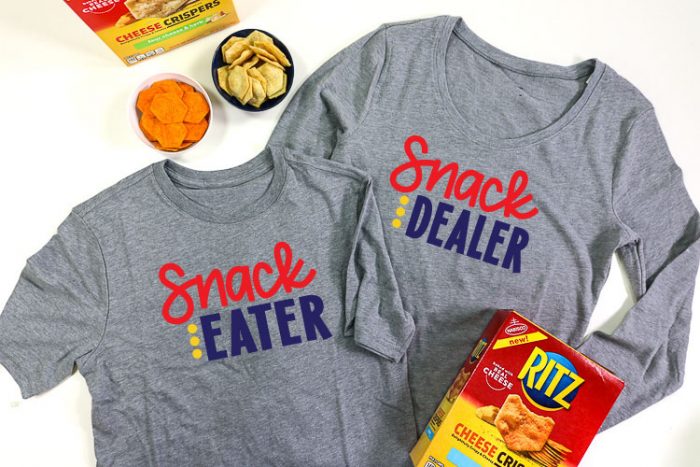 2 Grey shirts, adult shirt has Snack Dealer adn child shirt has snack eater in iron on vinyl - horizontal layout