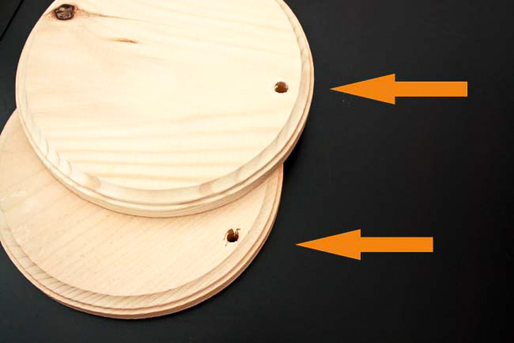 Drill holes in the circle wooden discs