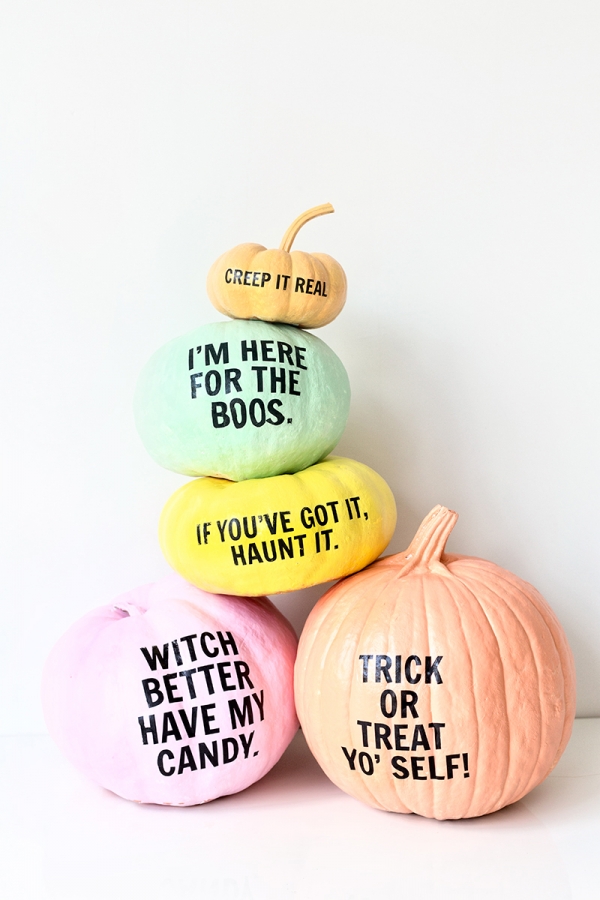 Pumpkins that have been painted and then puns added in adhesive vinyl