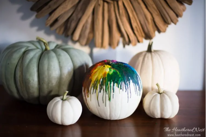 white pumkin with melted crayons dripped down