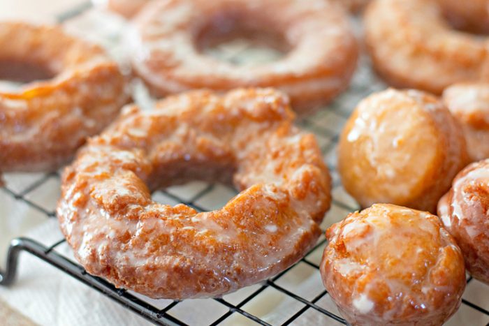 Close up of pumpkin donuts and pumpkin donut holes