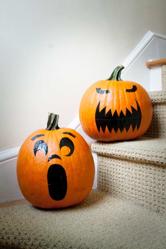 Pumpkins with faces added by using contact paper