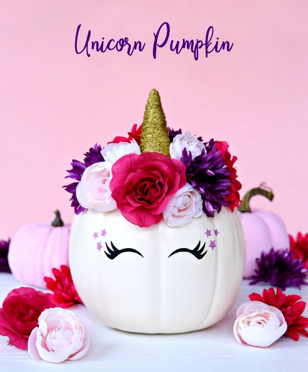 White pumpkin turned into a hunicorn with horn and flowers