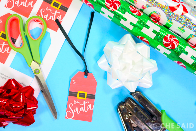 Adding a ribbon to the From Santa Gift Tag