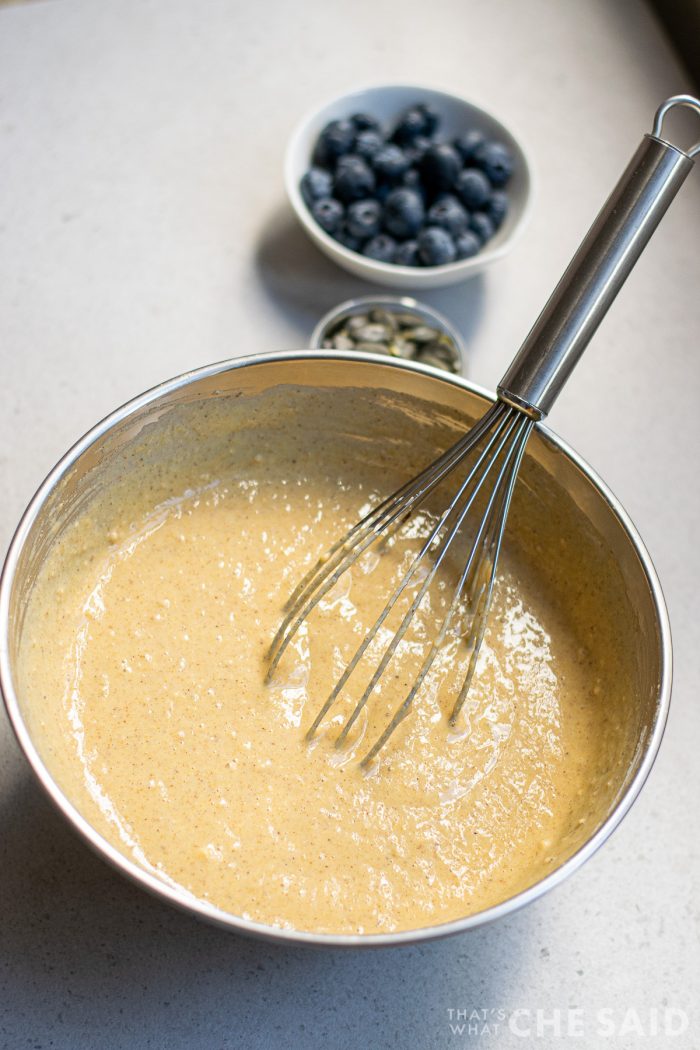 Combined pumpkin pancake batter in metal mixing bowl