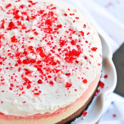 whole peppermint cheesecake with peppermint crushed bits on top