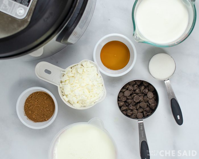 Instant Pot Tuxedo Hot Chocolate ingredients in small bowls and measuring cups