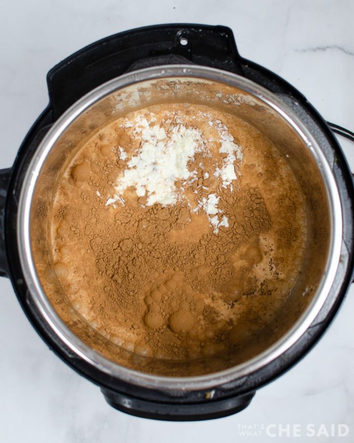 Tuxuedo Hot Chocolate ingredients added to the inner pot of the instant pot