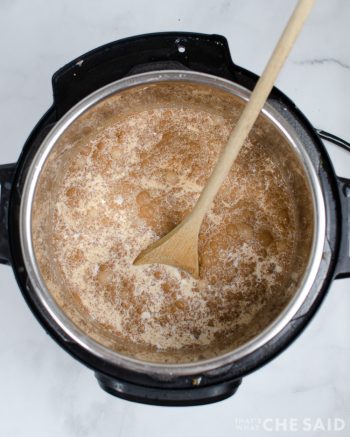 Stirring the ingredients with a wooden spoon