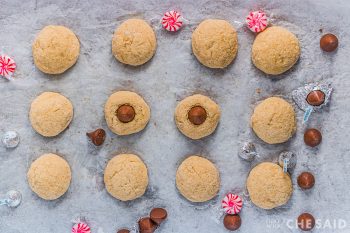 Pressing kisses in baked cookies