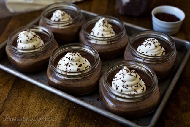 small mason jars with chocolate and whip