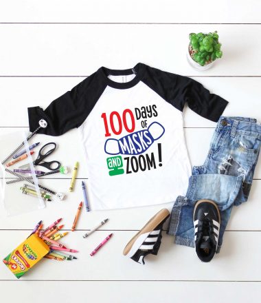 Vertical White background with black and white raglan t-shirt with 100 days of school design and school supplies