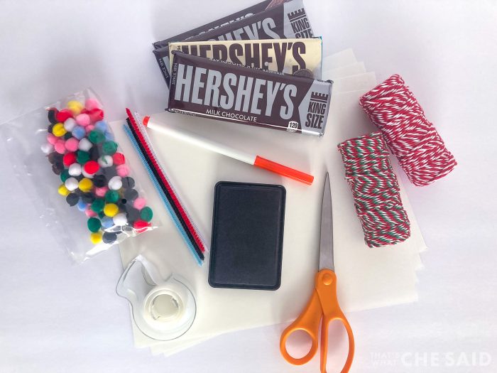 Hershey bars, crafts supplies to make snowman candybars