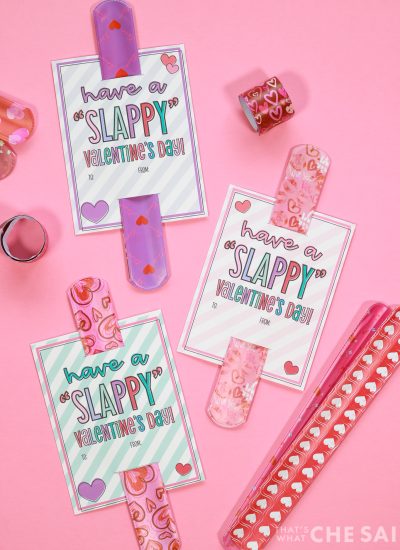 pink background with slap bracelets and printable valentines