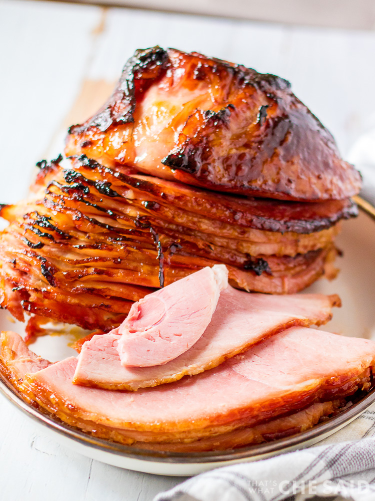 maple brown sugar sliced ham on a platter - vertical