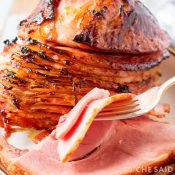 close up maple brown sugar sliced ham on a platter - square