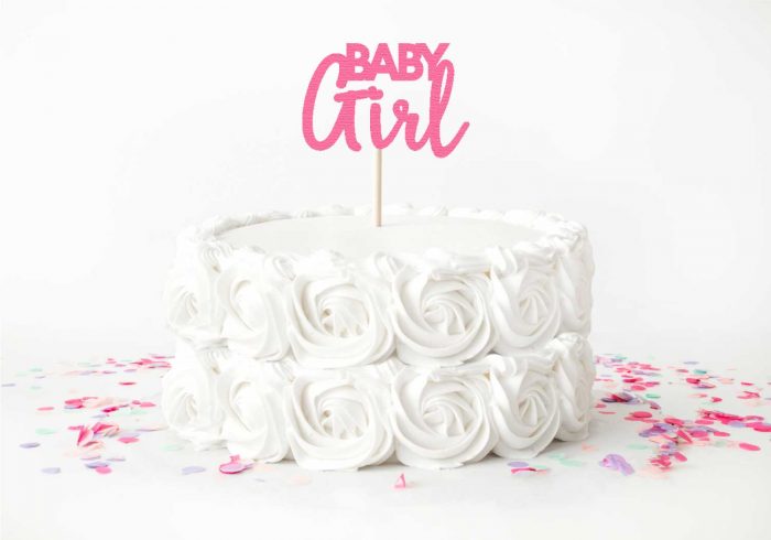 White Rose Cake with Pink "Baby Girl" Cake Topper