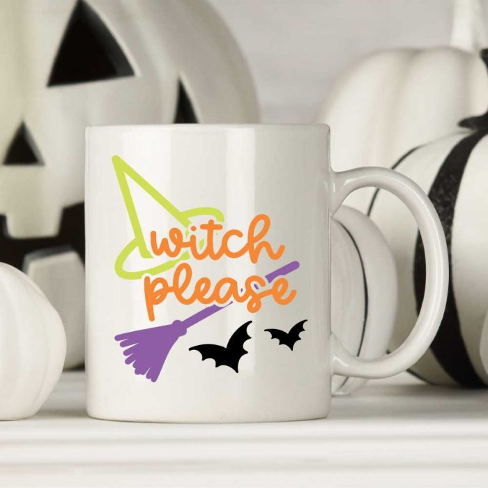 Halloween SVG on white mug with white pumpkins in background