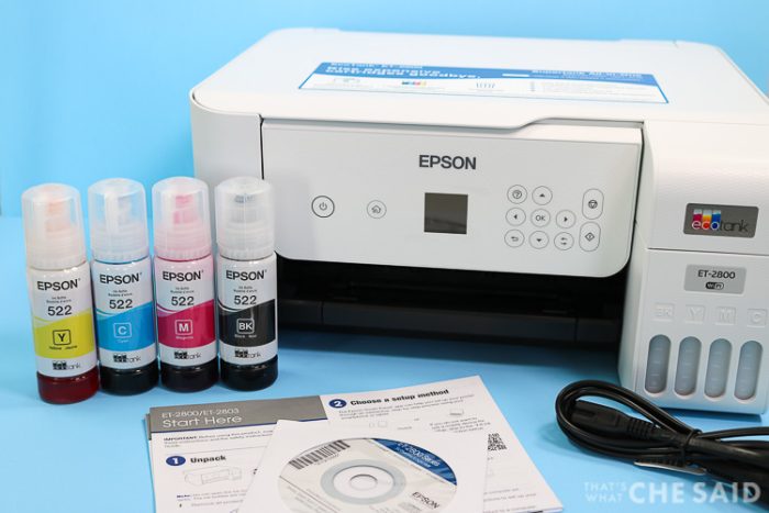 Contents of Epson EcoTank Printer, printer, ink, cord, instructions
