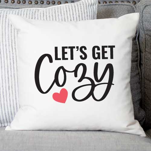 White Throw Pillow with Let's Get Cozy in iron on