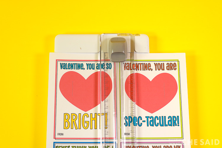 Yellow Background - Cutting Valentines apart using paper trimmer