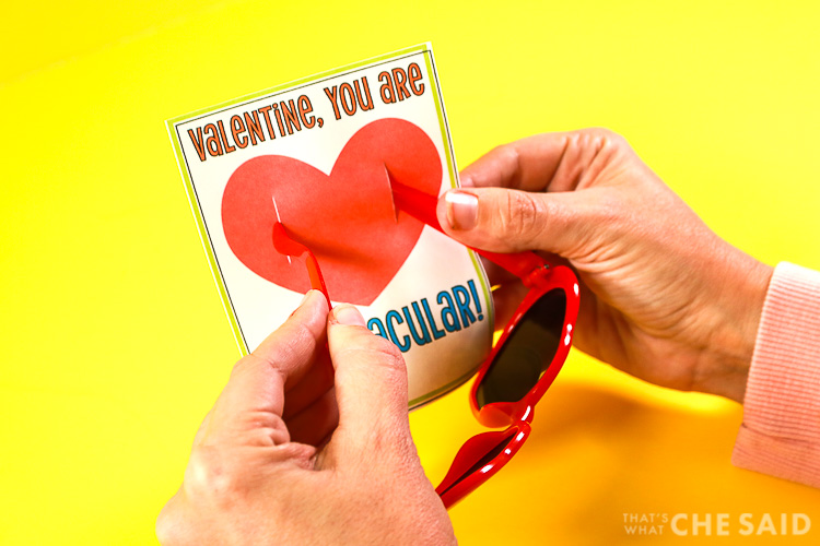 Inserting Sunglasses into slits on valentine card
