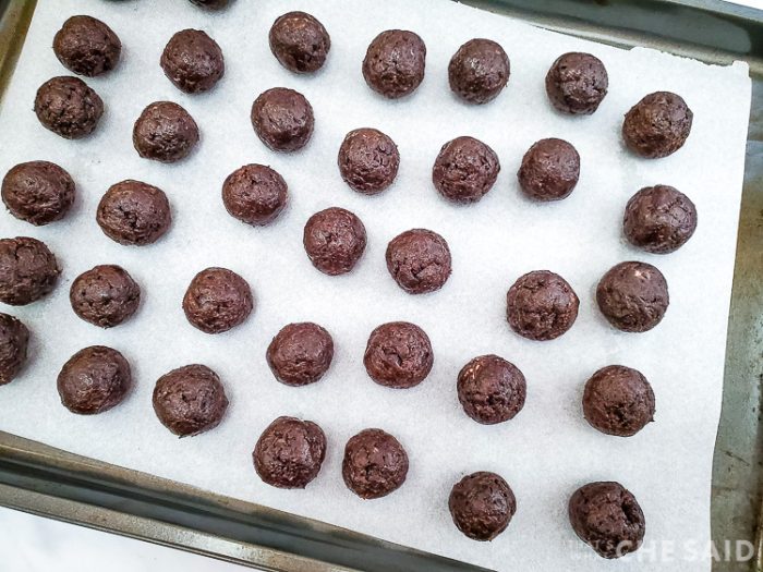 Oreo truffle balls on baking sheet lined with parchment