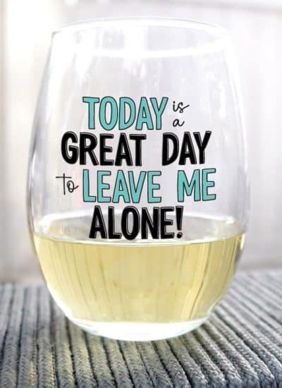 Wine glass with white wine and the phrase "Today is a great day to leave me alone