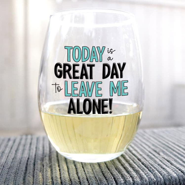 Wine glass with white wine and the phrase "Today is a great day to leave me alone