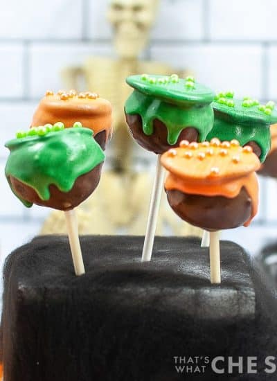 Cauldron Cake Pops with Orange and Green icing