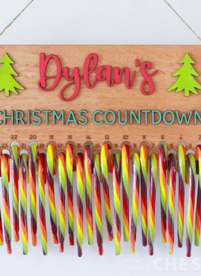 Colorful Candy Cane Christmas Countdown hanging on a white door - Square Format