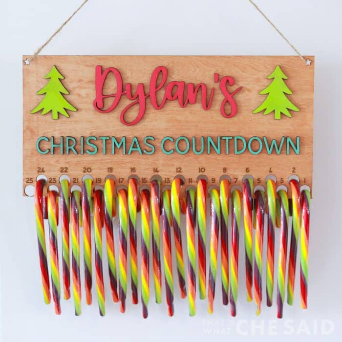 Colorful Candy Cane Christmas Countdown hanging on a white door - Square Format