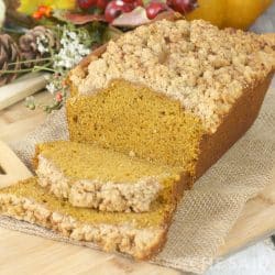 Pumpkin Bread with a Crumble Topping on a cutting board