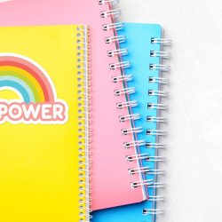 Girl power rainbow on notebooks